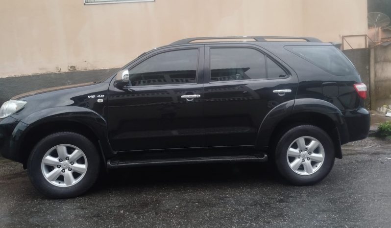 TOYOTA HILUX SW4 SRV 4.0 4X4 GASOLINA AT 2010 7 LUGARES full